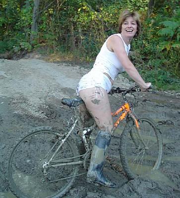 rides her bike in ridingboots 15710-rides-her-bike-in-ridingboots.jpg