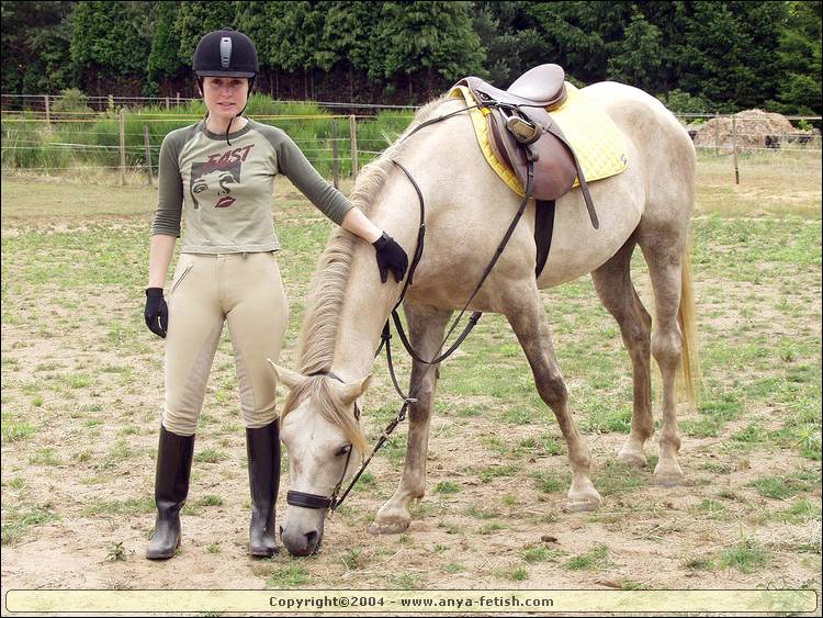 horse is sniffing her boots 18185-horse-is-sniffing-her-boots.jpg