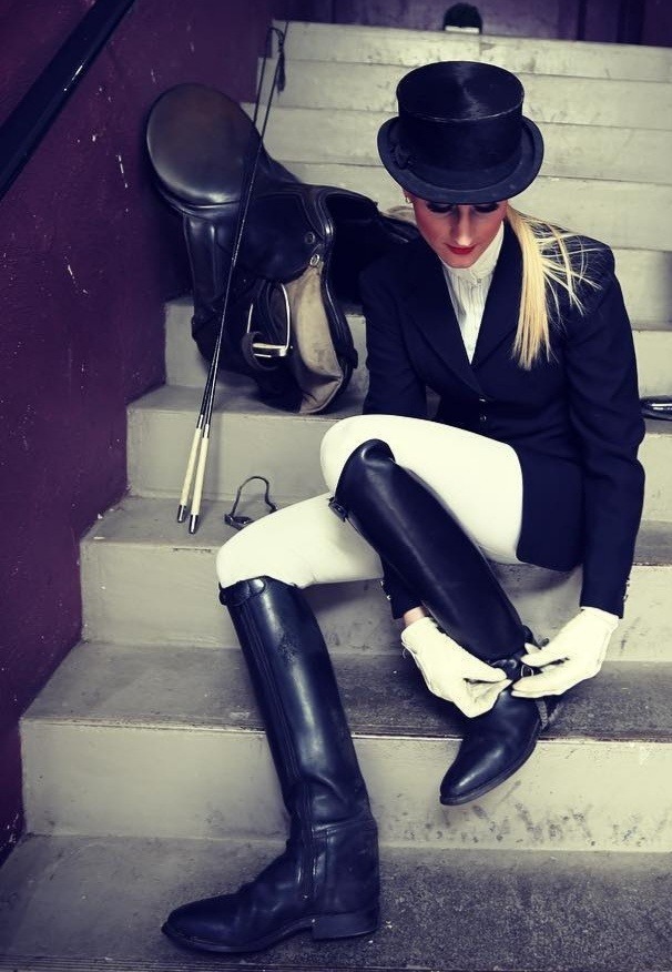 Attaching A Steel Spur To Her Lovely Long Black Leather Riding Boot 24742-attaching-a-steel-spur-to-her-lovely-long-black-leather-riding-boot.jpg